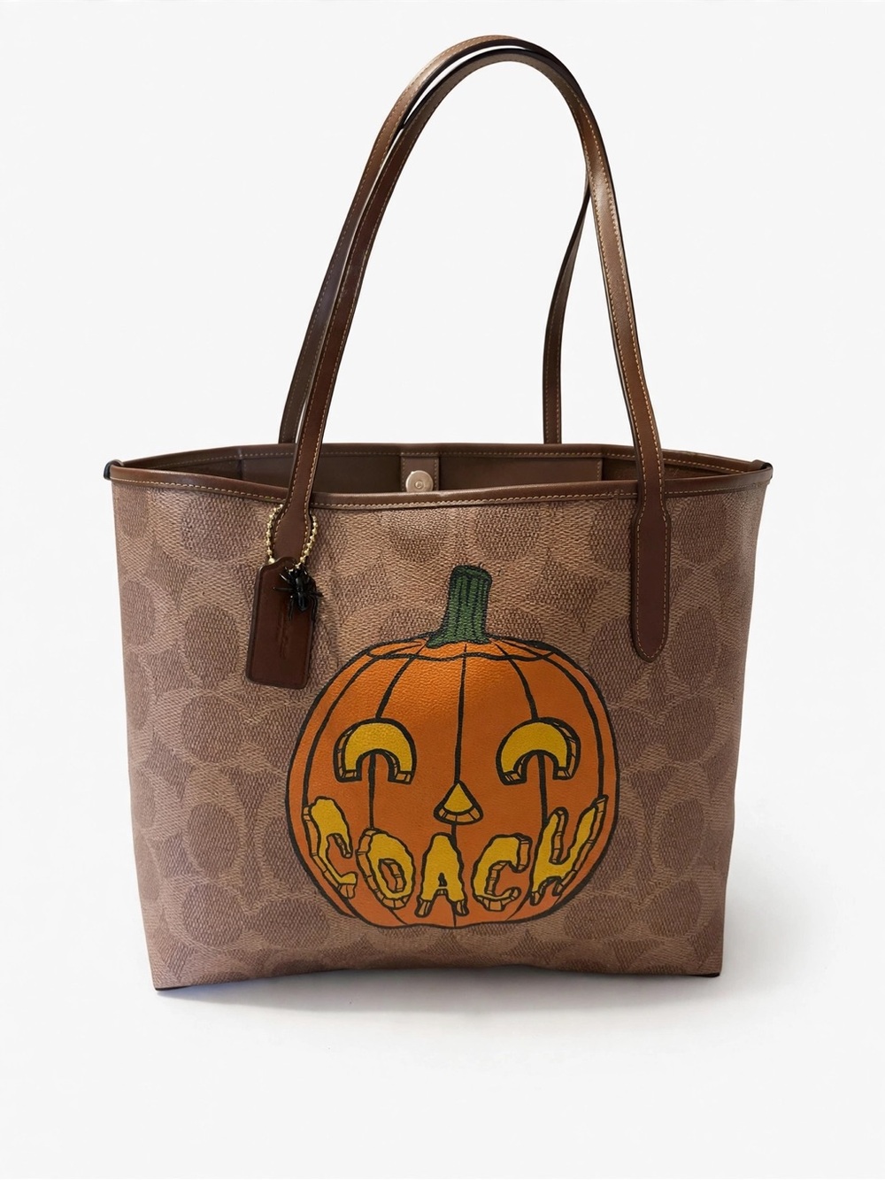 Coach Brown Signature Tote with Orange Pumpkin Graphic